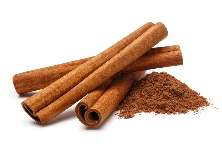 cinnamon sticks on white